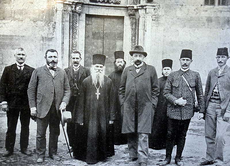 (front row from the left) French ambassador in Belgrade Mr Descos, the monk Cyril and the author in front of the portal of Deçani (Photo: Alexandre Baschmakoff, September 1908).